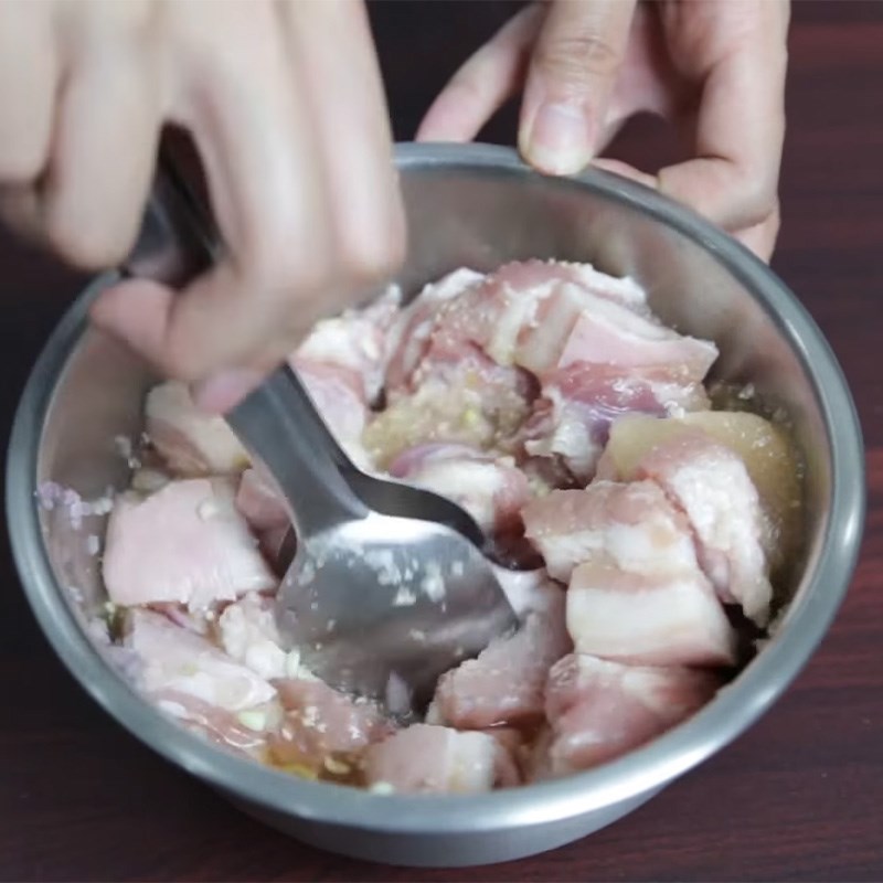 Step 1 Marinate the pork Braised Pork with Eggs